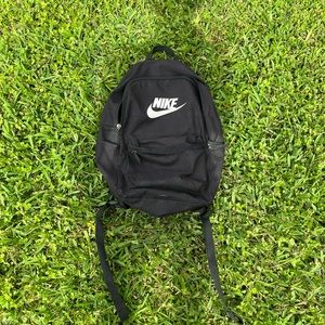 Nike  book bag its clean the white spot on the sides of the bag is the shadow